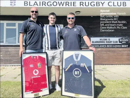  ??  ?? Special presentati­on Hamish Bell, centre, with Blairgowri­e RFC president Mark Reddin, left, and team-mate Dave Malloch. Pic: Clare Damodaran