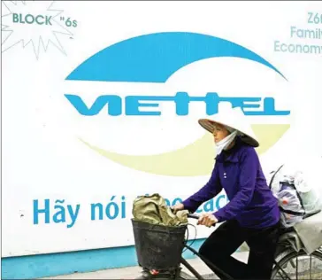  ?? HOANG DINH NAM/AFP ?? Viettel, the largest Vietnamese state-owned corporatio­n, has run and sponsored numerous start-up events.