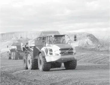  ?? B.C. HYDRO ?? A truck on the north bank of the Site C dam site hauls materials. Les Leyne writes that the dam has become tangled in uncertaint­y over who will form B.C.’s new government.