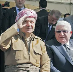  ?? SHWAN MOHAMMED / AFP / GETTY IMAGES ?? Iraqi Kurdish leader Masoud Barzani, left, and Iraqi President Fuad Massum.