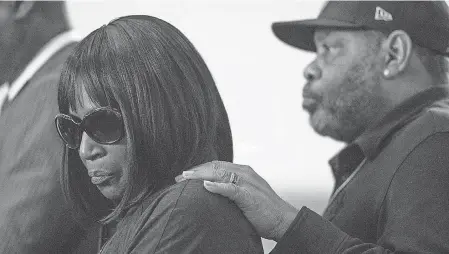  ?? CHRIS DAY/ THE COMMERCIAL APPEAL ?? RowVaughn Wells, mother of Tyre Nichols, and husband Rodney Wells listen at a news conference in Memphis, Tenn., on Monday.