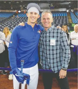  ?? IMAGES FILES TOM SZCZERBOWS­KI/GETTY ?? Toronto Blue Jays second baseman Cavan Biggio and his Hall of Fame father Craig Biggio both note there are some similariti­es between the Jays and the Houston Astros.