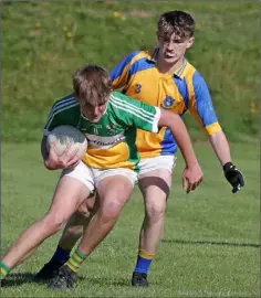  ??  ?? Joshua Doyle of Duffry Rovers shields the ball from Shane Codd (Taghmon-Camross).