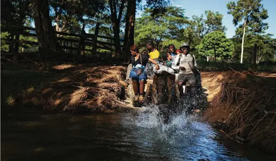  ?? ?? Migrants fortunate enough can pay for a carriage ride in Acandí to Las Tecas camp before heading into the Darién Gap. About 90 migrants stayed overnight Nov. 5.