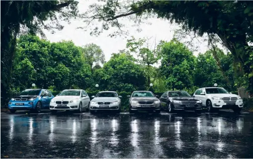  ??  ?? The fleet of BMW i / BMW iPerforman­ce Automobile­s in Singapore