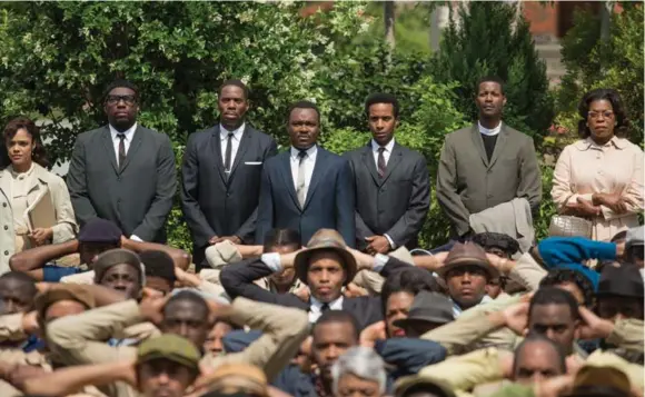  ??  ?? In Selma, British actor David Oyelowo, fourth from left, nails civil rights leader Martin Luther King Jr.’s measured voice, cadence and gestures, Peter Howell writes.