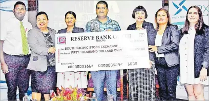  ?? Picture: JONA KONATACI ?? SPX board members and a senior representa­tive from Terrapin Holdings Ltd (right), receive the gold sponsorshi­p cheque from RBF governor Ariff Ali yesterday.