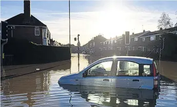  ?? OLI SCARFF/GETTY ?? George Osborne will have to find extra cash for flood defences after the storms