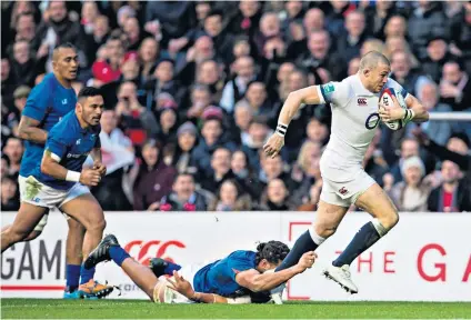  ??  ?? At full tilt: Mike Brown runs in a try against Samoa as England stretched their winning run to 22 in 23 under Eddie Jones