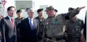 ?? — AP ?? US defence secretary Jim Mattis and South Korean defence minister Song Young-moo visit Observatio­n Post Ouellette in Paju near the truce village of Panmunjom in the demilitari­sed zone on the border between North and South Korea on Friday.