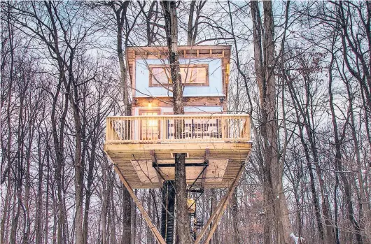  ?? CHRIS MCLELLAND PHOTOS ?? The Tin Shed treehouse at the Mohicans Treehouse Resort and Wedding Venue in Glenmont, Ohio.