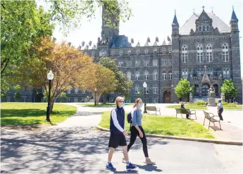  ?? — AFP file photo ?? The campus of Georgetown University is seen nearly empty as classes were cancelled due to the coronaviru­s pandemic, in Washington, DC.