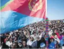  ?? AP ?? African migrants hold an Eritrean flag during a 2014 protest in Jerusalem.