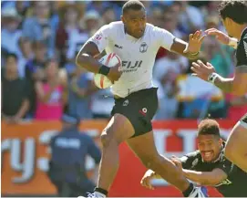  ?? Photo: World Rugby ?? Aisake Katonibau in action during the HSBC Seven Series .