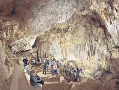  ?? Photograph­s from Redding Convention & Visitors Bureau ?? LAKE SHASTA CAVERNS, about 15 minutes north of Redding, is a geologic cathedral adorned in flowstone and calcite curtains.