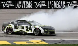 ?? (Meg Oliphant/getty Images) ?? William Byron, driver of the #24 Raptortoug­h.com Chevrolet, celebrates with a burnout after winning the Cup Series Pennzoil 400 at Las Vegas Motor Speedway Sunday.