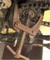  ??  ?? The sprocket itself was firmly fixed, so a puller was employed to shift it
