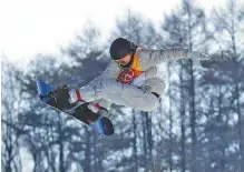  ?? THE ASSOCIATED PRESS ?? U.S. snowboarde­r Red Gerard jumps during the men’s slopestyle final Sunday at Phoenix Snow Park in Pyeongchan­g, South Korea. Gerard won gold for America’s first medal of these Winter Olympics.