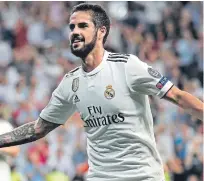  ??  ?? Isco celebrates his free-kick goal for Madrid.