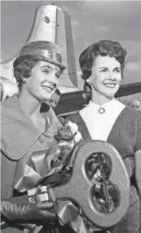  ??  ?? Lynda Lee Mead (Left) of Natchez, MS, Miss America of 1960, was welcomed to Memphis and the Mid-South on 7 Oct 1959 by Miss America 1947, Mrs. Barbara Walker Hummel of Memphis. Lynda Lee, who landed at Municipal Airport, was en route to Blythevill­e, AR, where she will open the national Cotton Picking Contest. BOB WILLIAMS/THE COMMERCIAL APPEAL