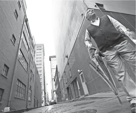  ??  ?? Memphis historian Jimmy Ogle describes the city's downtown alleyways on Sept. 27. PHOTOS BY JOE RONDONE/THE COMMERCIAL APPEAL,