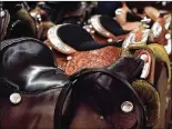  ?? CONTRIBUTE­D BY MEGHAN MCCARTHY ?? McLelland’s Saddlery sells a variety of saddles including custom-made saddles, basic riding saddles and elaborate show saddles in the store’s showroom.