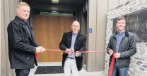  ?? PHOTO: LEIGH JEFFERY ?? Doing the honours . . . Queenstown Mayor Jim Boult cuts the ribbon to open the Arrowtown Community Centre watched by Arrowtown Community and Sports Centre Inc secretary Simon Spark (left) and Arrowtown councillor Scott Stevens.