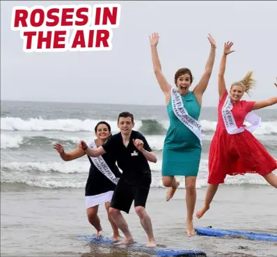  ??  ?? Wexford’s Dylan Walsh (second from left) with some of the Roses and fellow Rose of Tralee escorts having a whale of a time on Ballybunio­n Beach during the Rose Festival.