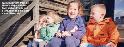  ?? ?? Gwilym Birkett from St Bride’s Major with his twin sisters Frieda and Flora, four, and his older sister Klara, eight