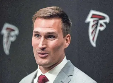  ?? MIKE STEWART/AP ?? New Falcons quarterbac­k Kirk Cousins is still recovering from an Achilles tendon tear last season.