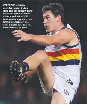  ??  ?? FORESIGHT: Adelaide recruiter Hamish Ogilvie (left) and key-position player Mitch McGovern, who was taken at pick 43 in 2014. McGovern is now one of the hottest properties in AFL after a stellar 2017 season, with finals still to come.