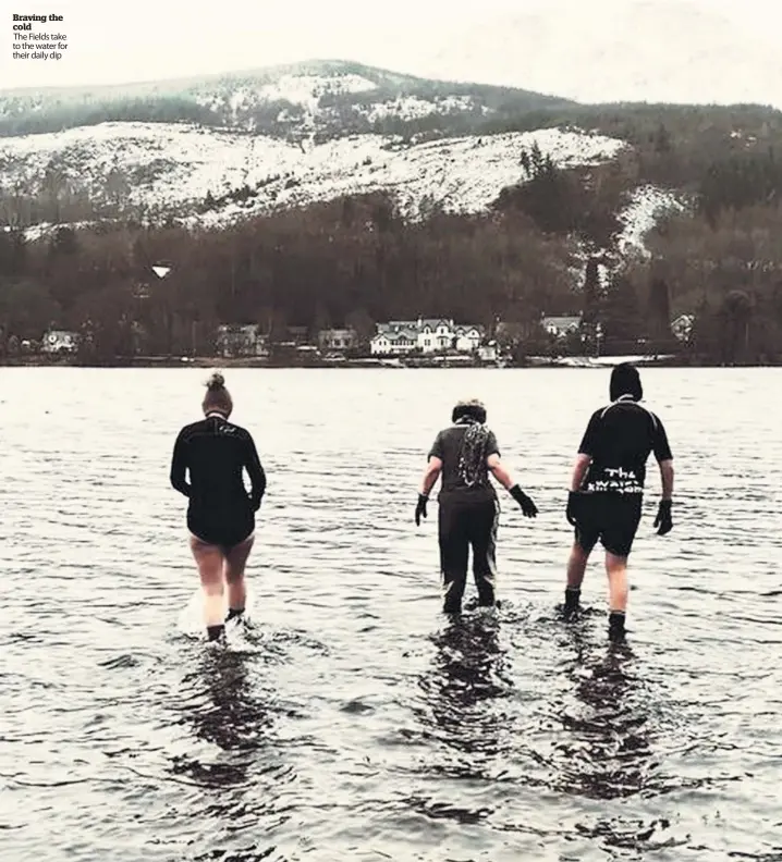  ??  ?? Braving the cold
The Fields take to the water for their daily dip