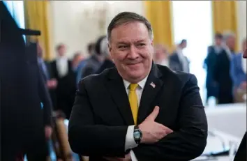  ?? Doug Mills/The New York Times ?? Secretary of State Mike Pompeo says Russia was “pretty clearly” behind the recent hacking of the U.S. government, but President Donald Trump contradict­ed him Saturday.