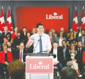  ?? CHRIS WATTIE / REUTERS ?? Justin Trudeau, addressing Liberals in Ottawa Wednesday, envisions “cuts and austerity” under a Tory government.