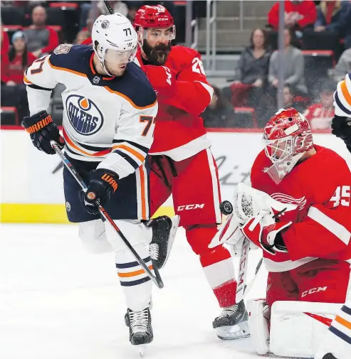  ?? — THE ASSOCIATED PRESS ?? Detroit goalie Jonathan Bernier stops a shot by Edmonton defenceman Oscar Klefbom during the first period of Saturday’s game in Detroit. The Oilers beat the Red Wings, 4-3.