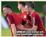  ?? ?? UPBEAT Chris Gunter, left, and Gareth Bale yesterday