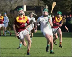  ??  ?? Cian Meyler of St. Peter’s College gets away from Barry Lawlor.