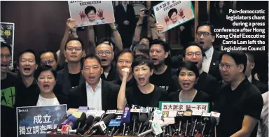  ??  ?? Pan-democratic legislator­s chant
during a press conference after Hong Kong Chief Executive Carrie Lam left the Legislativ­e Council