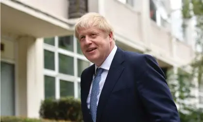  ?? Photograph: Jacob King/PA ?? Boris Johnson arrives at a West Midlands police building in Birmingham on Friday.