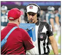  ?? AP file photo ?? Referee Gene Steratore reviews a touchdown reception during Super Bowl 52 on Feb. 4 in Minneapoli­s. The NFL’s catch rule could get less complicate­d if team owners approve recommenda­tions from the competitio­n committee when the league’s annual meetings...