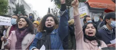  ?? Agence France-presse ?? Tunisians take part in an antigovern­ment rally in Tunis on Saturday.