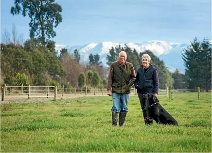 ??  ?? Westland Milk suppliers Paul and Ann Jarman are staying loyal to the co-operative despite low payouts and problems rolling out a new UHT plant near Christchur­ch.
