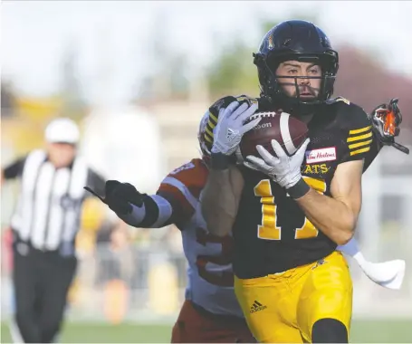  ?? PETER POWER/THE CANADIAN PRESS ?? Ticats receiver Luke Tasker says he’s happy to be back after playing only nine games this season due to injury.