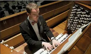  ??  ?? Organist Weston Jennings puts the new Nichols & Simpson organ at North Little Rock’s St. Luke’s Episcopal Church through its paces Tuesday.