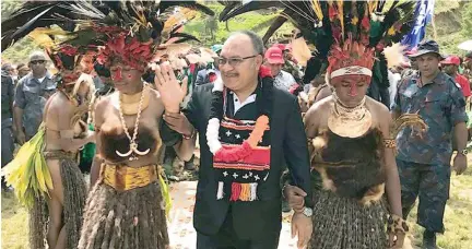  ??  ?? Papua New Guinea Prime Minister Peter O’Neill on the election campaign trail in Chimbu province.