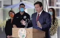  ?? LYNNE SLADKY/AP ?? Gov. Ron DeSantis speaks Thursday during a news conference on the coronaviru­s pandemic in Doral.