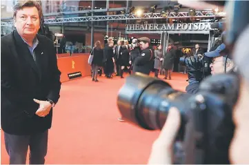  ??  ?? Finnish director and screenwrit­er Aki Kaurismaki arrives on the red carpet for the premiere of the film “The Other Side of Hope” in competitio­n at the 67th Berlinale film festival in Berlin. — AFP photo