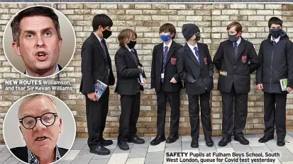  ??  ?? SAFETY Pupils at Fulham Boys School, South West London, queue for Covid test yesterday