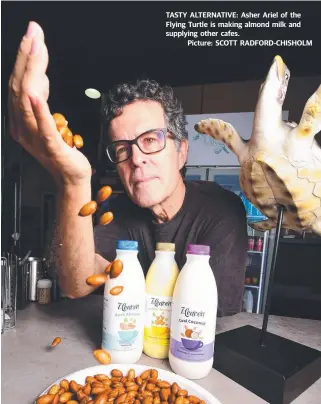  ?? TASTY ALTERNATIV­E: Asher Ariel of the Flying Turtle is making almond milk and supplying other cafes.
Picture: SCOTT RADFORD- CHISHOLM ??