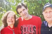  ?? ?? LEFT: Merle Glickman with husband Earl and their daughter Elyse. ABOVE: Merle and Earl with their son Paul.